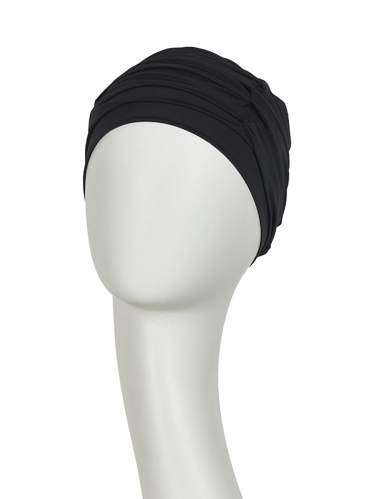 Wave Swim Cap is a beautiful swimming cap that can be used on holiday or in the swimming pool. The unique design construction ensures that the hat stays where it should during activity. A beautiful wrinkle effect on the hat adds perfect volume to the head. 