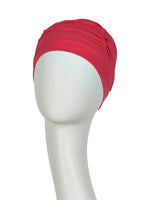 Wave Swim Cap is a beautiful swimming cap that can be used on holiday or in the swimming pool. The unique design construction ensures that the hat stays where it should during activity. A beautiful wrinkle effect on the hat adds perfect volume to the head. 